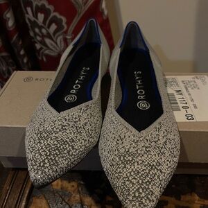 Rothy's flat. Worn 1X. Stretchy & very comfortable. Pearl metallic color